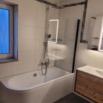 Bath with bathtub, shower, and sink