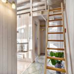 Niche with wooden ladder and plant. View into adjacent rooms.