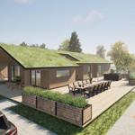 Modern villa with green roof, terrace, and garden area with seating.