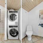 Bathroom with shower, washing machine and dryer, toilet and sink.