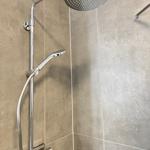 Shower with rain showerhead and handheld shower