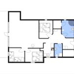 Dieses Apartment hat drei Schlafzimmer, eine Küche und ein Bad.