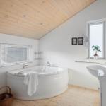 Bath with bathtub, sink and window