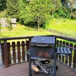 Balkon mit Treppe und Blick in den Garten