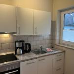 Wohn-/Schlafzimmer mit offener Küche