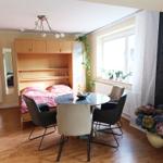 Schrankbett im Wohnzimmer - geöffnet