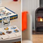 Table with game and glass next to fireplace with burning wood stove.