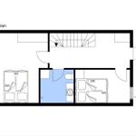 Floor plan shows living and sleeping areas with kitchen and stairs.