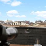 Terrace with binocular view of village and sky