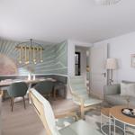 Wohn- und Essbereich mit Sofa, Stühlen und Wandbildern