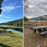 Picknicktisch und Grillplatz am Fluss mit Blick auf bewaldete Berge.