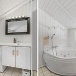Bathroom with washing machine and bathtub under sloped ceiling