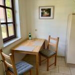 Küche mit Backofen, Ceranfeld, Mikrowelle und Kaffeemaschine in unserer Ferienwohnung Harztraum in Blankenburg im Harz