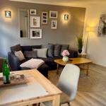 Heller Wohnbereich mit Essplatz in der Ferienwohnung Wanderlust in Blankenburg im Harz