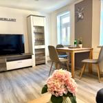 Heller Wohnbereich mit Essplatz in der Ferienwohnung Wanderlust in Blankenburg im Harz