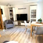 Heller Wohnbereich mit Essplatz in der Ferienwohnung Wanderlust in Blankenburg im Harz