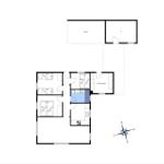 Functional floor plan with three bedrooms, kitchen, and bathroom.