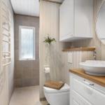 Bathroom with sink, toilet, and shower.