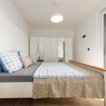 Bedroom with bed, nightstand, and bedroom furniture.