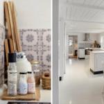 Küche mit weißem Schrank und Mosaikfliesen an der Wand