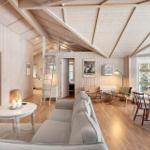 Living and dining area with wooden ceiling, sofa, table and chairs. Access to kitchen and bedroom.