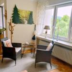 Leseecke vor dem großen Panoramafenster. (3 Flügel)