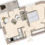 Dieses Apartment hat eine Küche, ein Wohnzimmer, ein Schlafzimmer und ein Badezimmer.