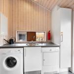 Washing and drying area with sink and window