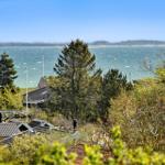 House with view of sea and trees