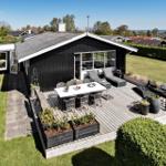 House with large deck, grill, and garden. View of the sea.