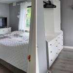 Schlafzimmer mit Bett, TV und Kleiderschrank. Fenster mit Vorhängen.