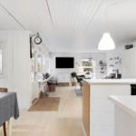 Living kitchen with dining area, TV, and windows