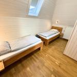 Drittes Schlafzimmer mit zwei Einzelbetten im Obergeschoss