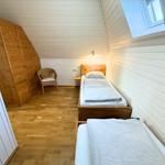 Drittes Schlafzimmer mit zwei Einzelbetten im Obergeschoss