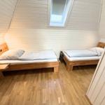 Drittes Schlafzimmer mit zwei Einzelbetten im Obergeschoss