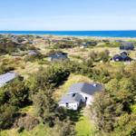 House with garden and view of the sea