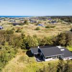 House with terrace in green surroundings, view of sea and villages
