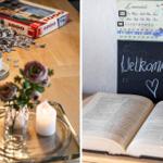 Table with puzzle, tea, flowers, and candle. Wall calendar and open book.