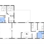 Apartment with three bedrooms, kitchen, and two bathrooms. Floor plan with orientation.