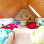 Das Schlafzimmer mit drei Betten