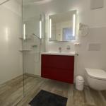 Bathroom with shower, sink and toilet