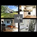 Ferienhaus Anker mit moderner Küche, Wohnbereich mit Kamin und Dusche