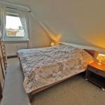 Schlafzimmer mit Doppelbett (SW-Lage)