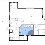 Apartment with kitchen, bathroom, and bedroom. Hallway and living area are visible.