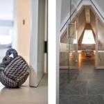 Große Seilrolle an Tür und Holzsitzbad mit Glaswand