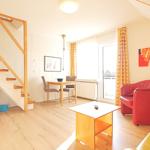 Wohnzimmer mit Blick zum Westbalkon