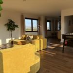 Wohnbereich mit gelbem Sofa, Fußboden und Fenster mit Blick auf Feld.