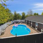 House with pool and terrace in greenery