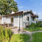 Haus mit Terrasse, Garten und Blick auf See
