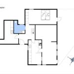 Floor plan shows living area with kitchen, bathroom, and bedroom.